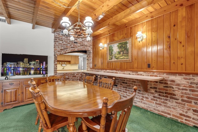 21800 SW 152nd Ave, Miami, FL 33170 - dining area with carpet flooring, wood ceiling, a chandelier, beam ceiling, and brick wall