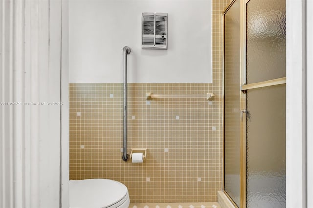 21800 SW 152nd Ave, Miami, FL 33170 - full bathroom featuring tile walls, a stall shower, and toilet