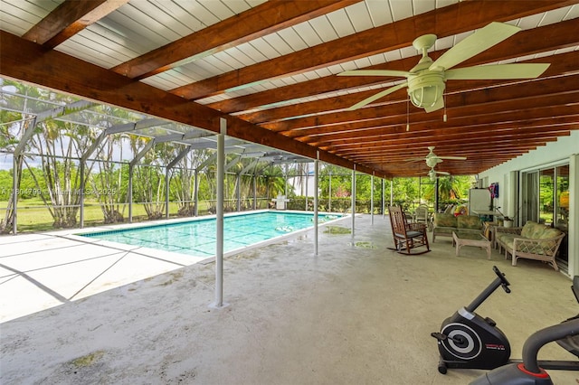 21800 SW 152nd Ave, Miami, FL 33170 - swimming pool featuring a patio, ceiling fan, outdoor lounge area, and glass enclosure