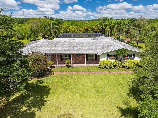 21800 SW 152nd Ave, Miami, FL 33170 - ranch-style house featuring a wooded view and a front yard