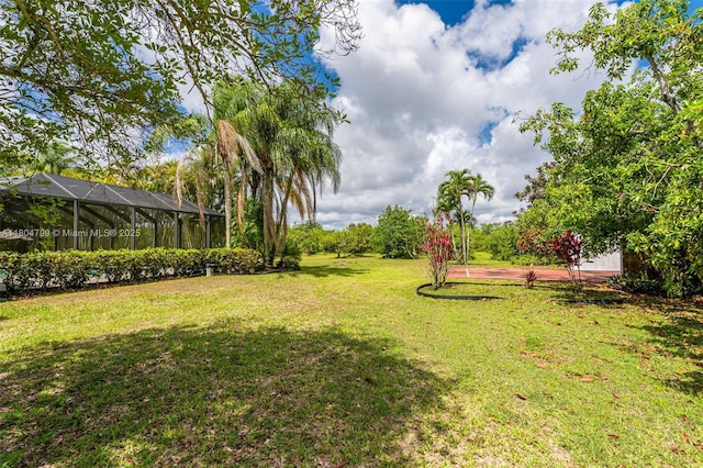 21800 SW 152nd Ave, Miami, FL 33170 - view of green lawn featuring a carport