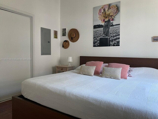 2001 Biscayne Blvd Unit 2306, Miami, FL 33137 - bedroom featuring electric panel and wood finished floors