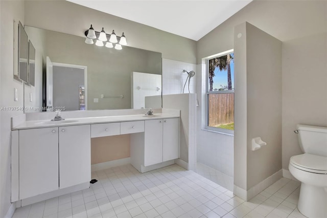 18225 NW 21st St, Pembroke Pines, FL 33029 - bathroom with a walk in shower, toilet, double vanity, baseboards, and tile patterned flooring