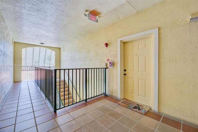 7330 NW 114th Ave Unit 304-5, Doral, FL 33178 - doorway to property featuring a balcony and stucco siding