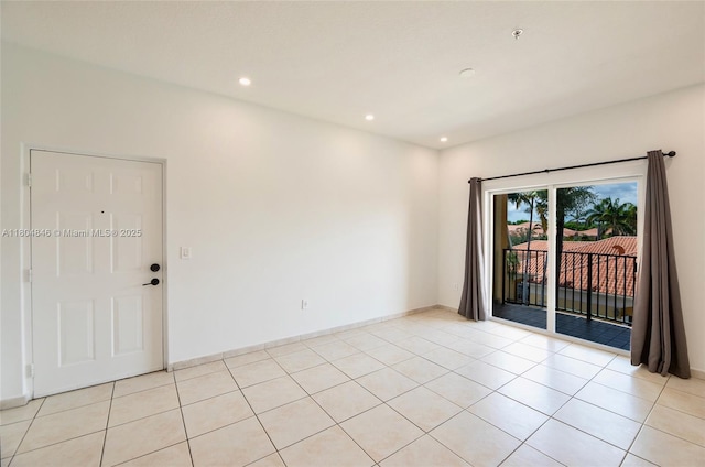 7330 NW 114th Ave Unit 304-5, Doral, FL 33178 - unfurnished room with light tile patterned floors, recessed lighting, and a pendent fire sprinkler