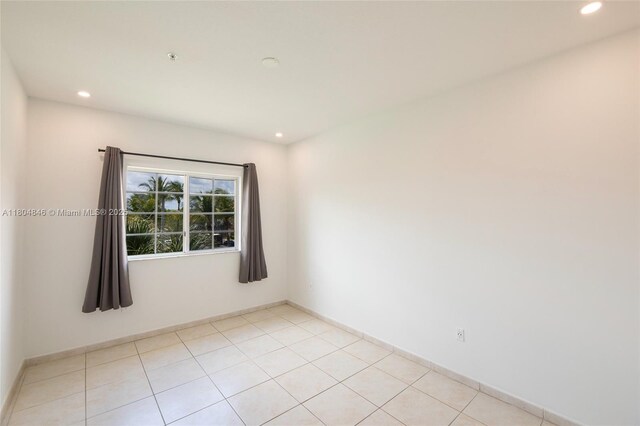 7330 NW 114th Ave Unit 304-5, Doral, FL 33178 - spare room featuring recessed lighting and baseboards