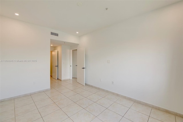 7330 NW 114th Ave Unit 304-5, Doral, FL 33178 - empty room with recessed lighting, light tile patterned floors, and baseboards