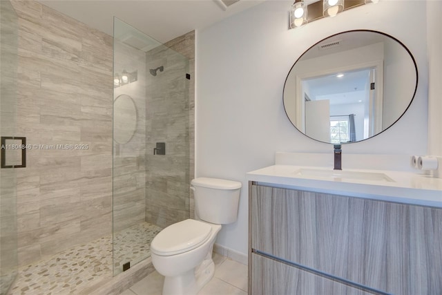7330 NW 114th Ave Unit 304-5, Doral, FL 33178 - full bath with tile patterned floors, toilet, a shower stall, and vanity