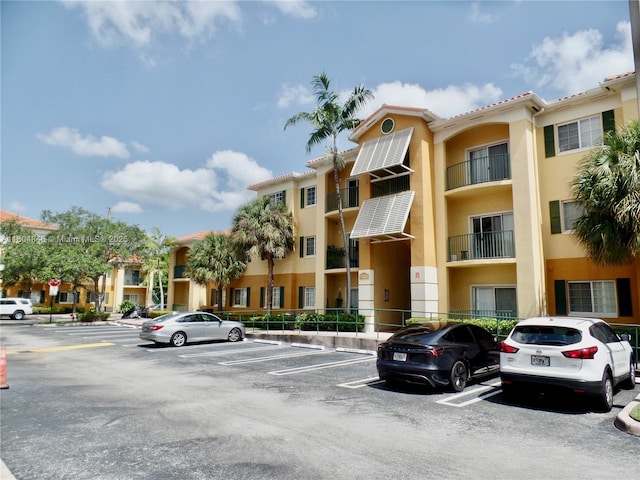 7330 NW 114th Ave Unit 304-5, Doral, FL 33178 - view of apartment building / complex with uncovered parking
