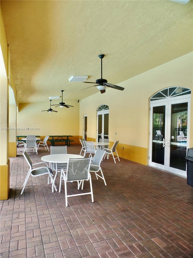 7330 NW 114th Ave Unit 304-5, Doral, FL 33178 - view of patio / terrace with french doors and a ceiling fan