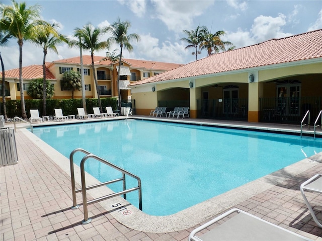 7330 NW 114th Ave Unit 304-5, Doral, FL 33178 - community pool featuring fence and a patio area