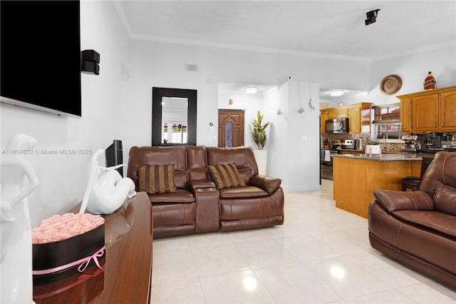 19251 SW 118th Ct, Miami, FL 33177 - living area featuring ornamental molding and light tile patterned floors