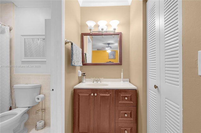 19251 SW 118th Ct, Miami, FL 33177 - full bathroom with a closet, tile walls, toilet, ceiling fan, and vanity