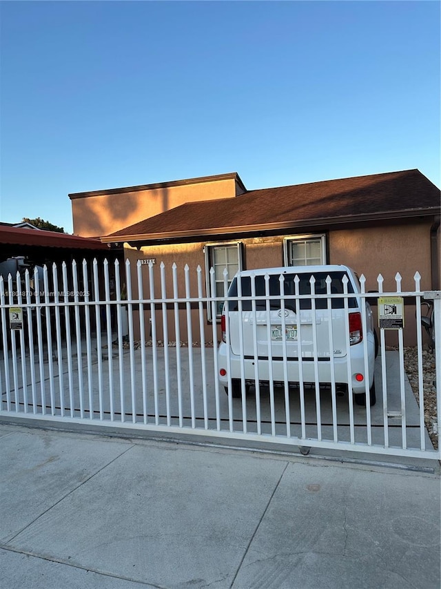 19251 SW 118th Ct, Miami, FL 33177 - view of front of property featuring a fenced front yard and stucco siding
