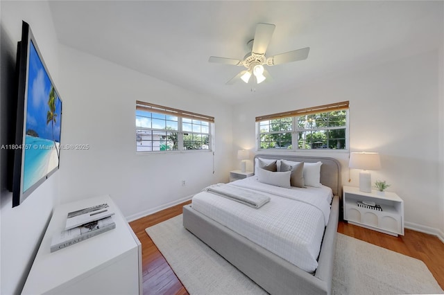 13521 S Biscayne River Rd, Miami, FL 33161 - bedroom with baseboards, wood finished floors, and ceiling fan