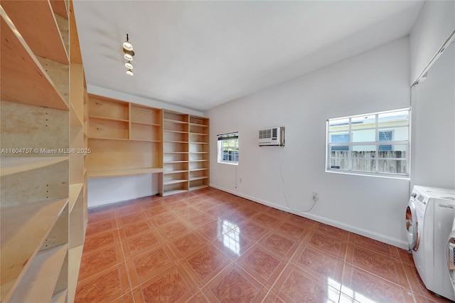 13521 S Biscayne River Rd, Miami, FL 33161 - washroom with washer and clothes dryer, a wall unit AC, baseboards, and light tile patterned floors
