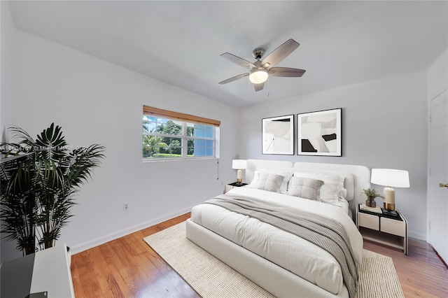 13521 S Biscayne River Rd, Miami, FL 33161 - bedroom with light wood finished floors, baseboards, and ceiling fan