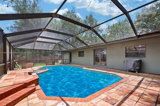 7505 SW 167th St, Palmetto Bay, FL 33157 - view of pool featuring a patio, glass enclosure, and fence