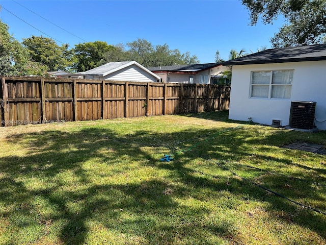 6845 SW 12th St, Pembroke Pines, FL 33023 - view of yard featuring central AC unit