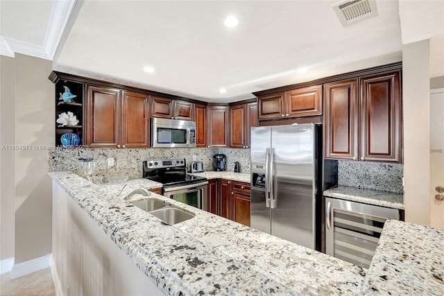 3725 S Ocean Dr Unit 1014, Hollywood, FL 33019 - kitchen with stainless steel appliances, a sink, wine cooler, backsplash, and open shelves