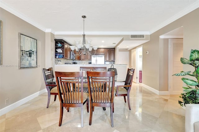 3725 S Ocean Dr Unit 1014, Hollywood, FL 33019 - dining room with a chandelier, crown molding, and baseboards
