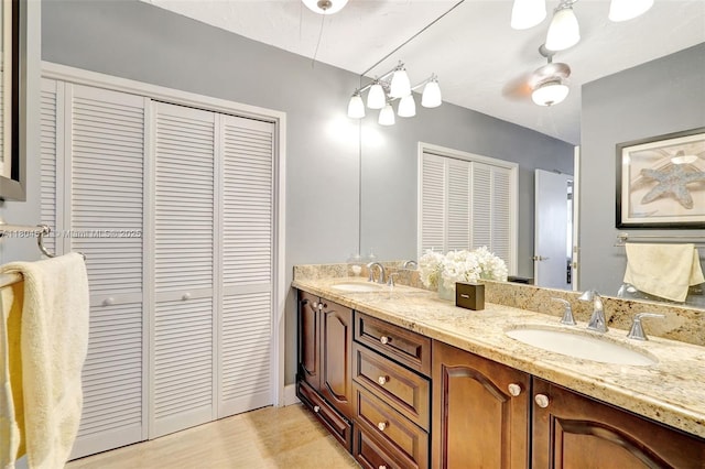 3725 S Ocean Dr Unit 1014, Hollywood, FL 33019 - bathroom featuring a closet and double vanity