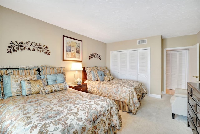 3725 S Ocean Dr Unit 1014, Hollywood, FL 33019 - bedroom with light colored carpet, a closet, and baseboards