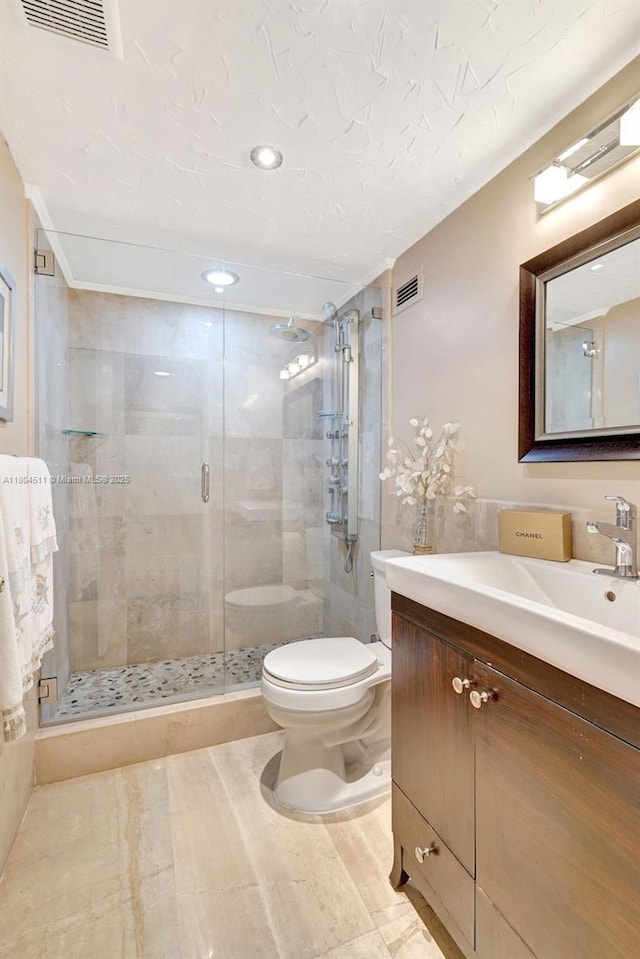 3725 S Ocean Dr Unit 1014, Hollywood, FL 33019 - bathroom with vanity, toilet, a shower stall, and recessed lighting