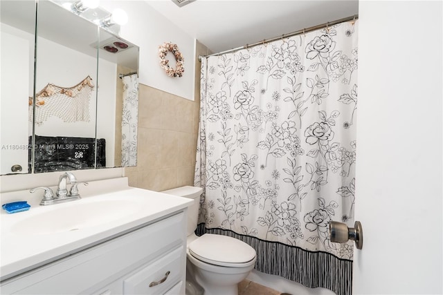 1980 S Ocean Dr Unit 9K, Hallandale Beach, FL 33009 - bathroom with tile walls, toilet, vanity, and a shower with curtain
