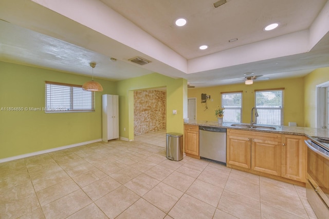 7717 Coral Blvd, Miramar, FL 33023 - kitchen featuring stainless steel dishwasher, a sink, range with electric stovetop, light tile patterned floors, and recessed lighting