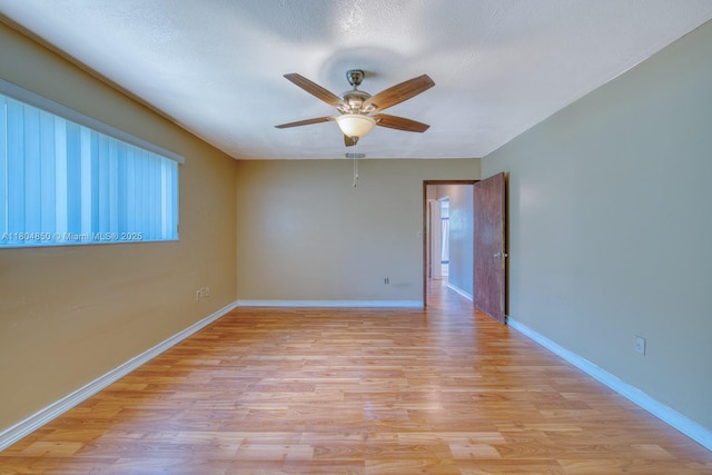 7717 Coral Blvd, Miramar, FL 33023 - spare room featuring light wood-style flooring, a ceiling fan, and baseboards