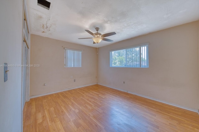 7717 Coral Blvd, Miramar, FL 33023 - spare room featuring light wood finished floors, baseboards, and ceiling fan