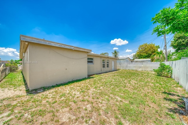 7717 Coral Blvd, Miramar, FL 33023 - back of house with stucco siding