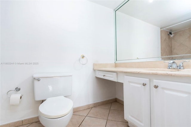 6770 Indian Creek Dr Unit 4P, Miami Beach, FL 33141 - bathroom with toilet, vanity, baseboards, and tile patterned flooring