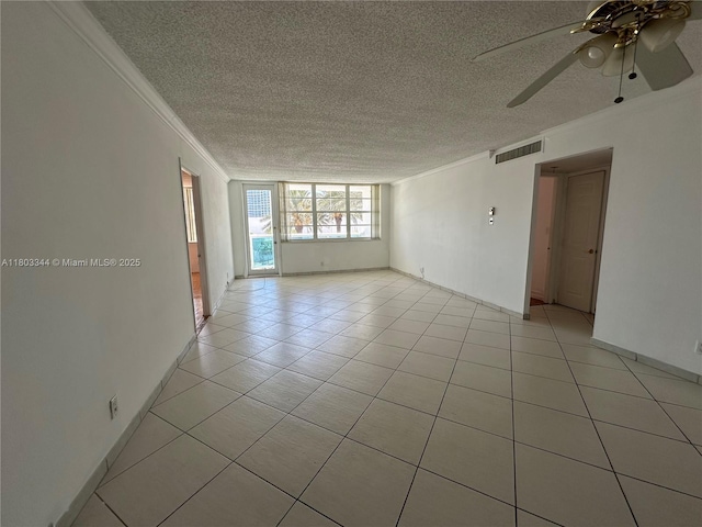 6770 Indian Creek Dr Unit 4P, Miami Beach, FL 33141 - spare room featuring ornamental molding, a textured ceiling, light tile patterned floors, ceiling fan, and baseboards