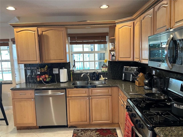13833 NW 22nd St, Sunrise, FL 33323 - kitchen featuring stainless steel appliances, a sink, backsplash, dark stone countertops, and recessed lighting