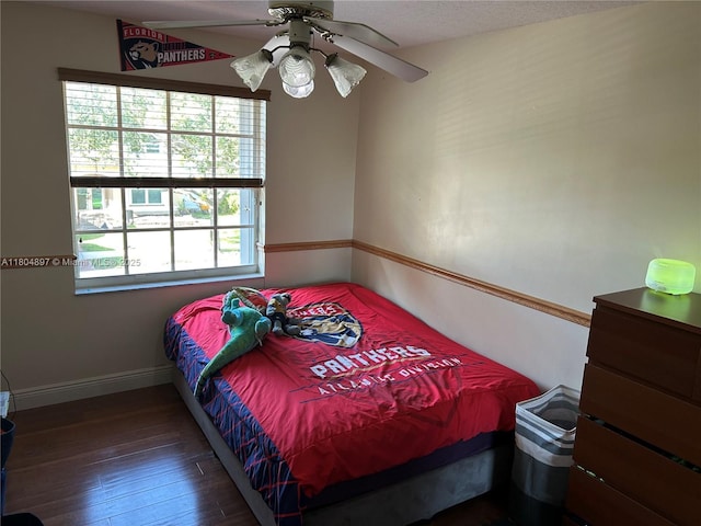 13833 NW 22nd St, Sunrise, FL 33323 - bedroom featuring hardwood / wood-style floors, baseboards, and a ceiling fan