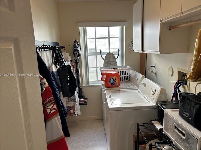 13833 NW 22nd St, Sunrise, FL 33323 - laundry area featuring independent washer and dryer, cabinet space, and light tile patterned floors