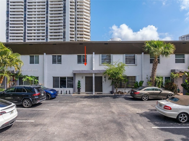 3553 NE 171st St Unit P, North Miami Beach, FL 33160 - view of apartment building / complex with uncovered parking