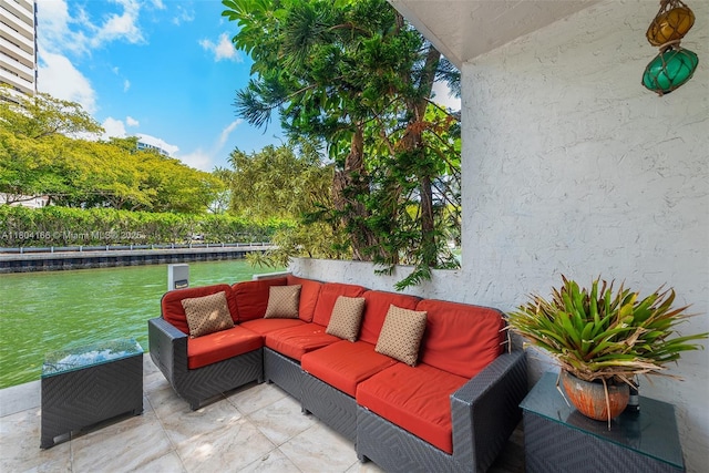 3553 NE 171st St Unit P, North Miami Beach, FL 33160 - view of patio / terrace with outdoor lounge area and a water view