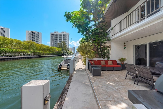 3553 NE 171st St Unit P, North Miami Beach, FL 33160 - dock featuring a water view, an outdoor hangout area, a view of city, and a balcony