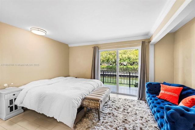 3553 NE 171st St Unit P, North Miami Beach, FL 33160 - tiled bedroom featuring access to outside and crown molding