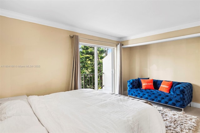 3553 NE 171st St Unit P, North Miami Beach, FL 33160 - bedroom featuring crown molding, access to exterior, and baseboards