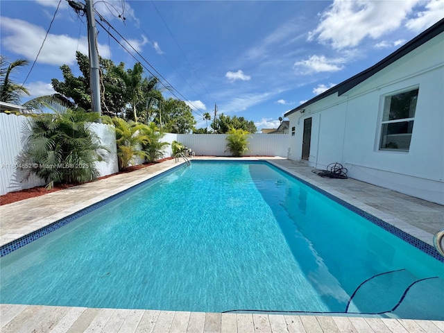 5101 SW 112th Pl, Miami, FL 33165 - view of swimming pool with a fenced backyard