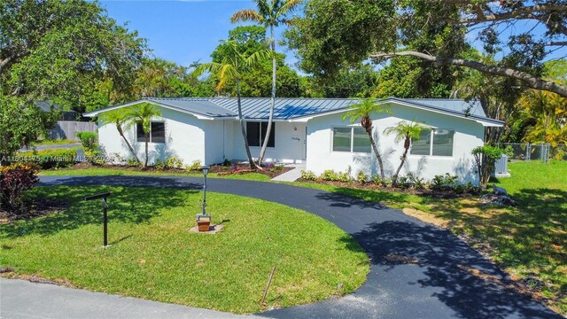 17640 SW 84th Ct, Palmetto Bay, FL 33157 - ranch-style home with asphalt driveway, stucco siding, and metal roof