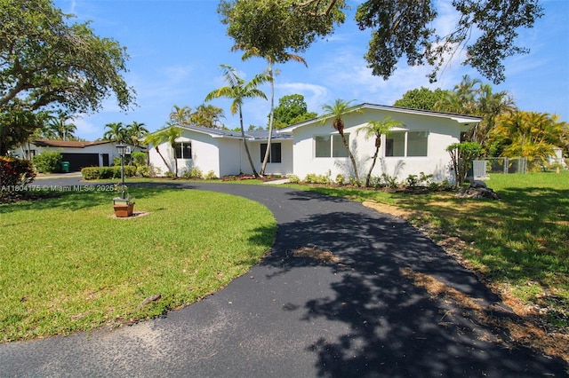 17640 SW 84th Ct, Palmetto Bay, FL 33157 - ranch-style house featuring stucco siding and driveway
