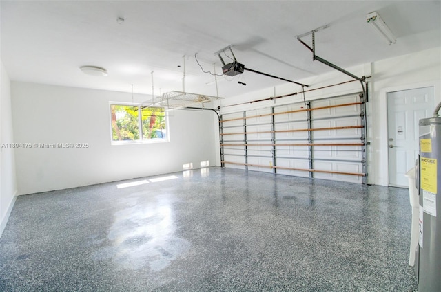 17640 SW 84th Ct, Palmetto Bay, FL 33157 - garage featuring electric water heater and a garage door opener