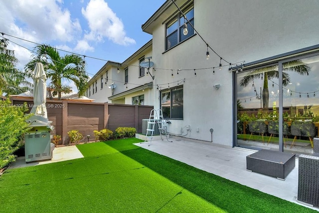 15678 NW 91st Ct, Miami Lakes, FL 33018 - back of house with a patio and stucco siding