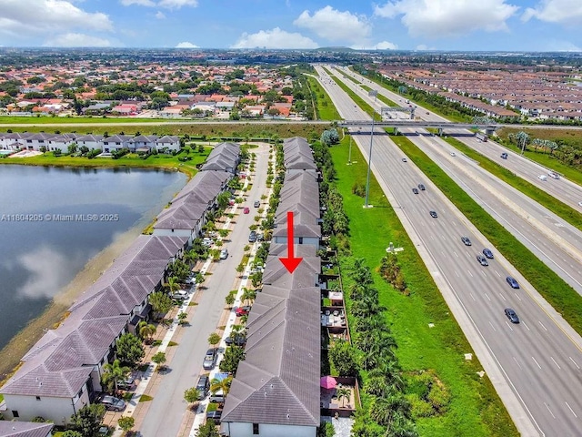 15678 NW 91st Ct, Miami Lakes, FL 33018 - aerial view of residential area with a major roadway and a large body of water