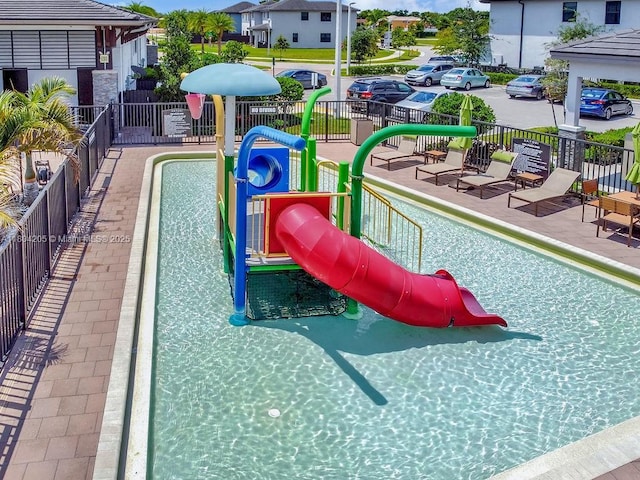 15678 NW 91st Ct, Miami Lakes, FL 33018 - view of swimming pool featuring fence
